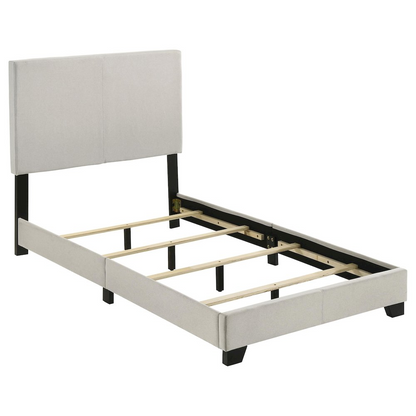 Cream fabric upholstered twin panel bed by Start2Finish with a sleek, modern design and sturdy wooden frame.
