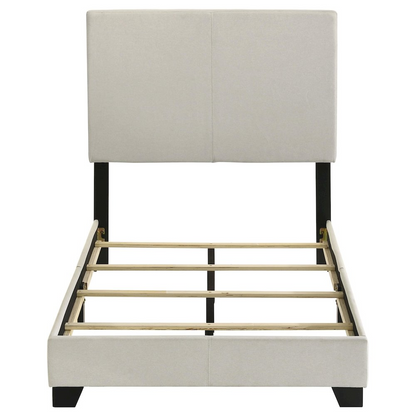 Cream fabric upholstered twin panel bed by Start2Finish with a modern design and padded headboard for a stylish bedroom look.
