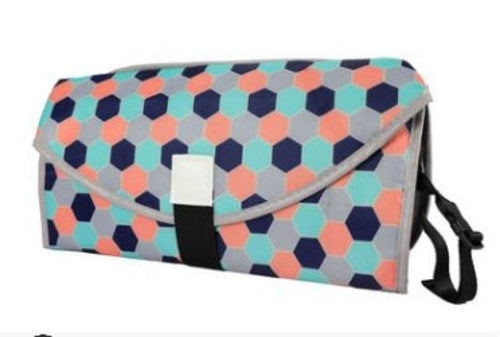 Soft, padded baby changing pad by CJDropshipping, designed for comfortable diaper changes for infants and toddlers.