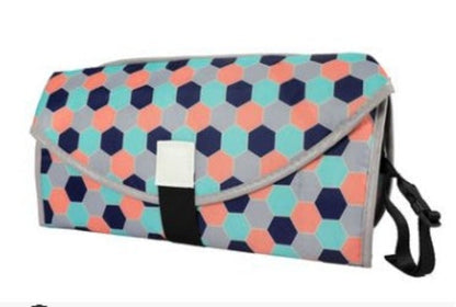 Soft, padded baby changing pad by CJDropshipping, designed for comfortable diaper changes for infants and toddlers.