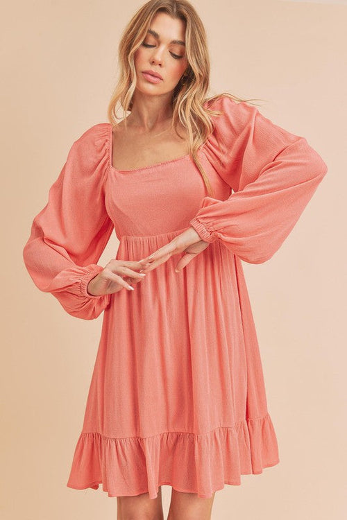 Jade Icarus Taya Dress for women, stylish and flowing with a fitted bodice and knee-length skirt, perfect for casual or dressy occasions.