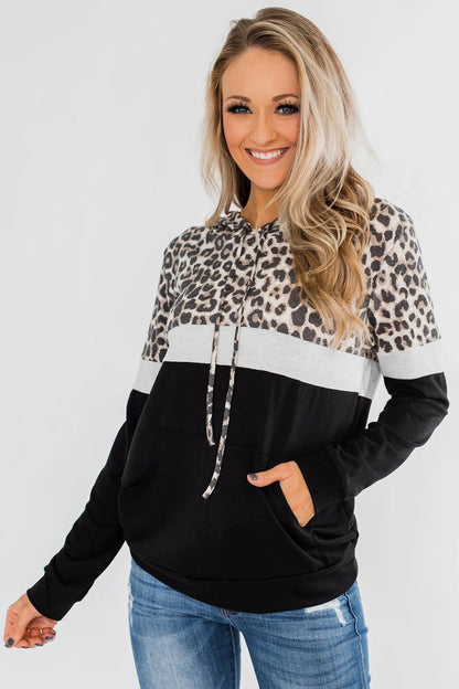 Jade Into the Jungle color block hoodie for women featuring vibrant jungle-inspired design and comfortable casual fit.
