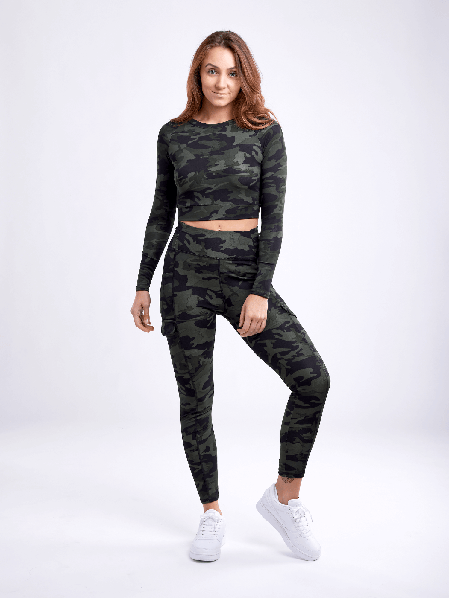 Black Lavender JupiterGear long-sleeve crop top for activewear, fitted black top with long sleeves and modern style.