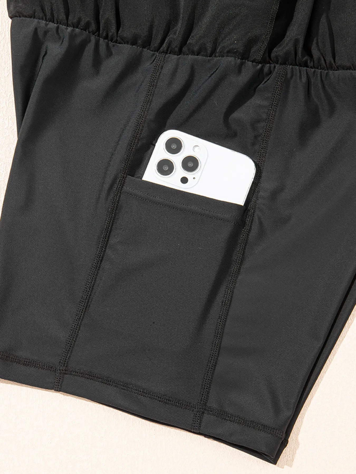 Pear Daisy high waisted drawstring swim shorts with a relaxed fit, featuring a stylish waistband and lightweight fabric.