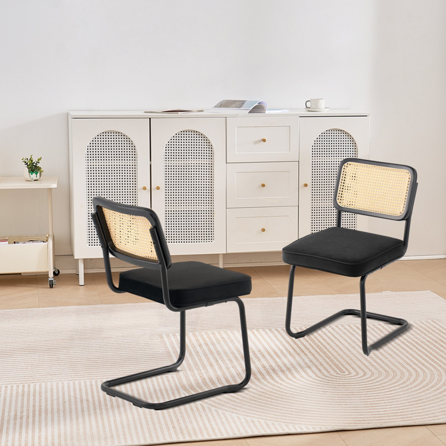 Set of 2 black VEVOR rattan chairs with upholstered velvet seats and rattan backs, mid-century modern dining or accent chairs.