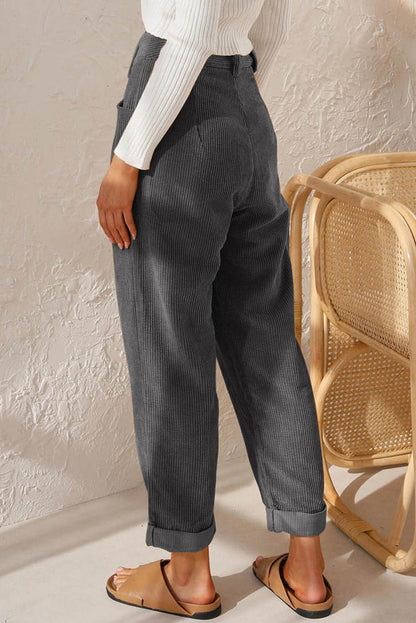 Gray corduroy high waist straight leg pants by Carmine Juneberry, showing the textured fabric and tailored fit.