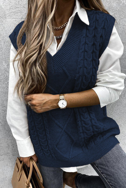 Blue sleeveless cable knitted sweater tank for women by Lavender Pallas, featuring a cozy, stylish sleeveless design and cable knit texture.