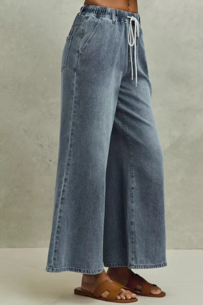 Pear Daisy SO ME mid-rise elastic waist flare denim jeans, showcasing classic fit, stylish flare legs, and durable denim fabric.