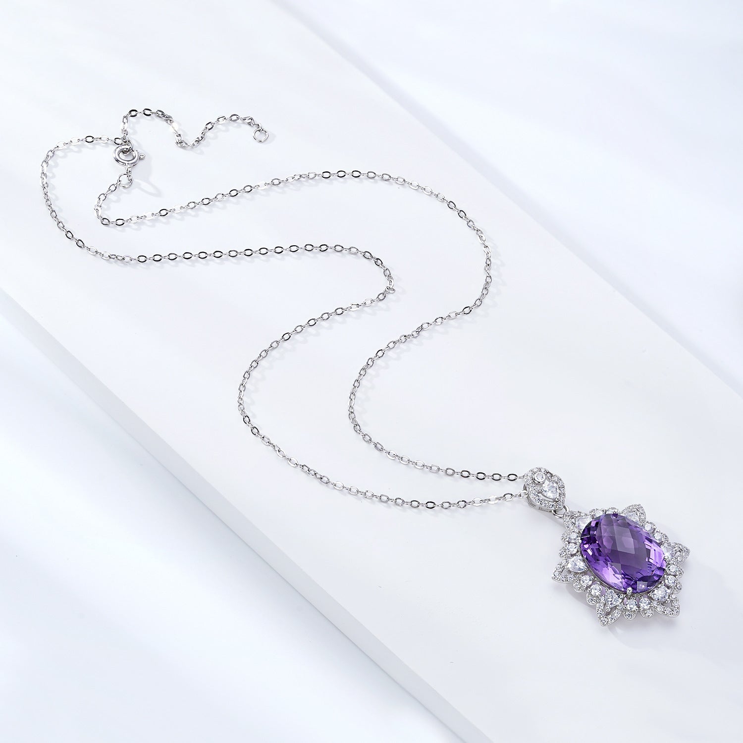 Carmine Juneberry LuxeJewels Amélys Clarity Pendant necklace with a sparkling gemstone on a delicate chain.