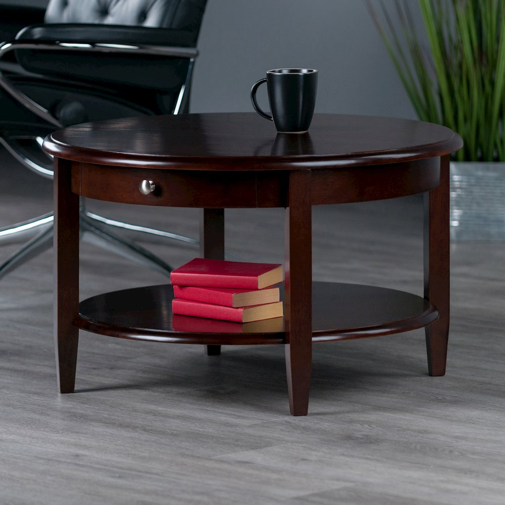 Start2Finish Concord round coffee table with drawer and shelf, showcasing smooth wood surface and functional storage features.