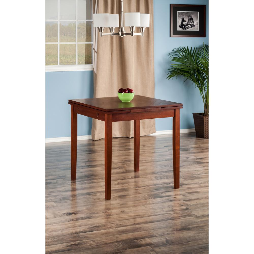 Start2Finish Pulman Extension Table in walnut wood showing the rectangular surface with extended leaves for extra dining space.