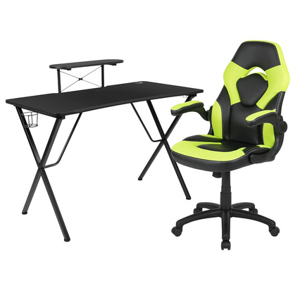 Black gaming desk with a green and black racing chair from Start2Finish, featuring ergonomic design and spacious workspace.