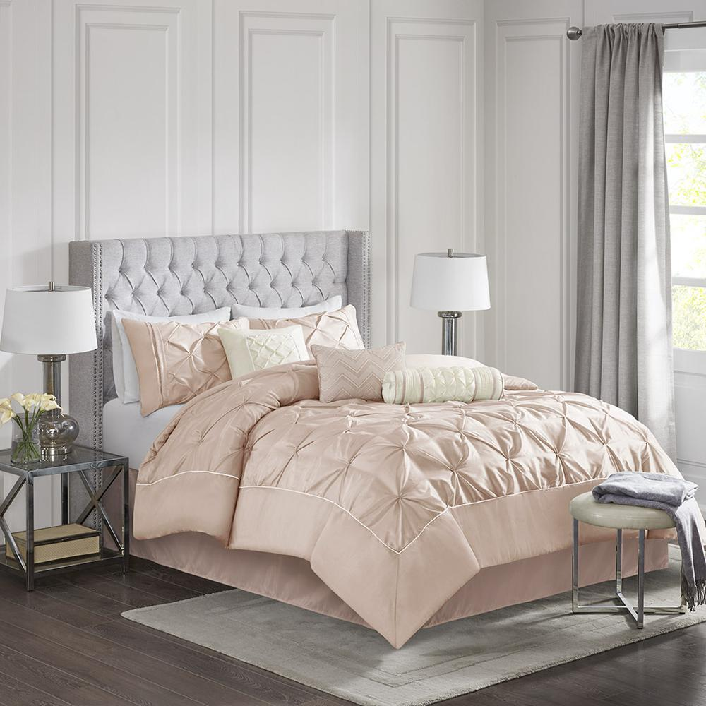 Start2Finish Laurel 7-piece tufted blush comforter bedding set with matching pillow shams on a bed.