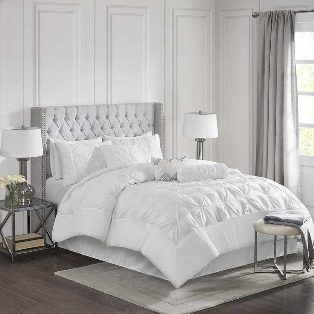 White Laurel 7-piece tufted comforter bedding set by Start2Finish with decorative pillows and matching bed skirt.