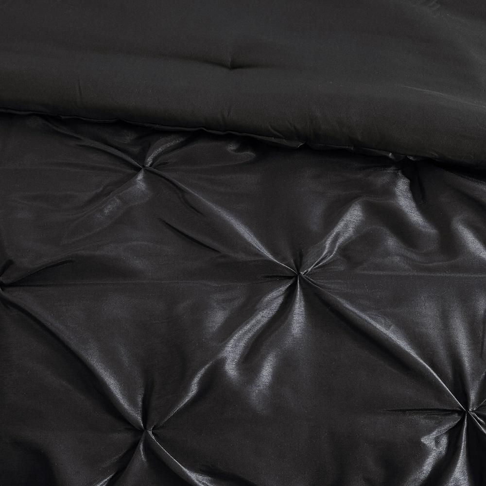 Start2Finish Laurel 7-piece tufted black bedding comforter set with decorative pillows on a bed.