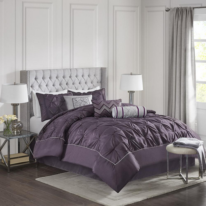 Start2Finish Laurel 7-piece tufted comforter set in plum, showing the elegant, plush bedspread and matching pillow shams.