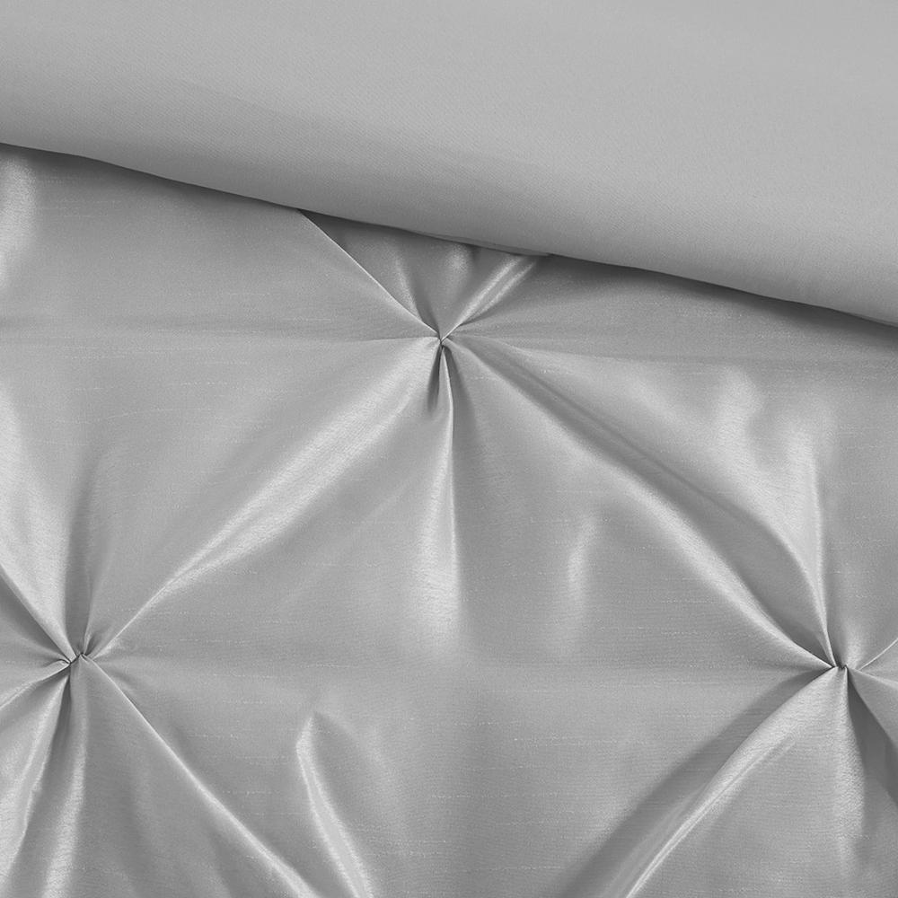 Start2Finish Laurel 7-piece tufted grey comforter set with matching pillow shams and decorative accents on a bed.