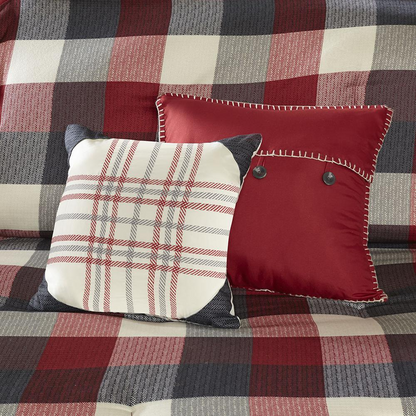 Start2Finish Ridge 7-Piece Red Herringbone Comforter Set on a bed with matching pillow shams and decorative pillows.