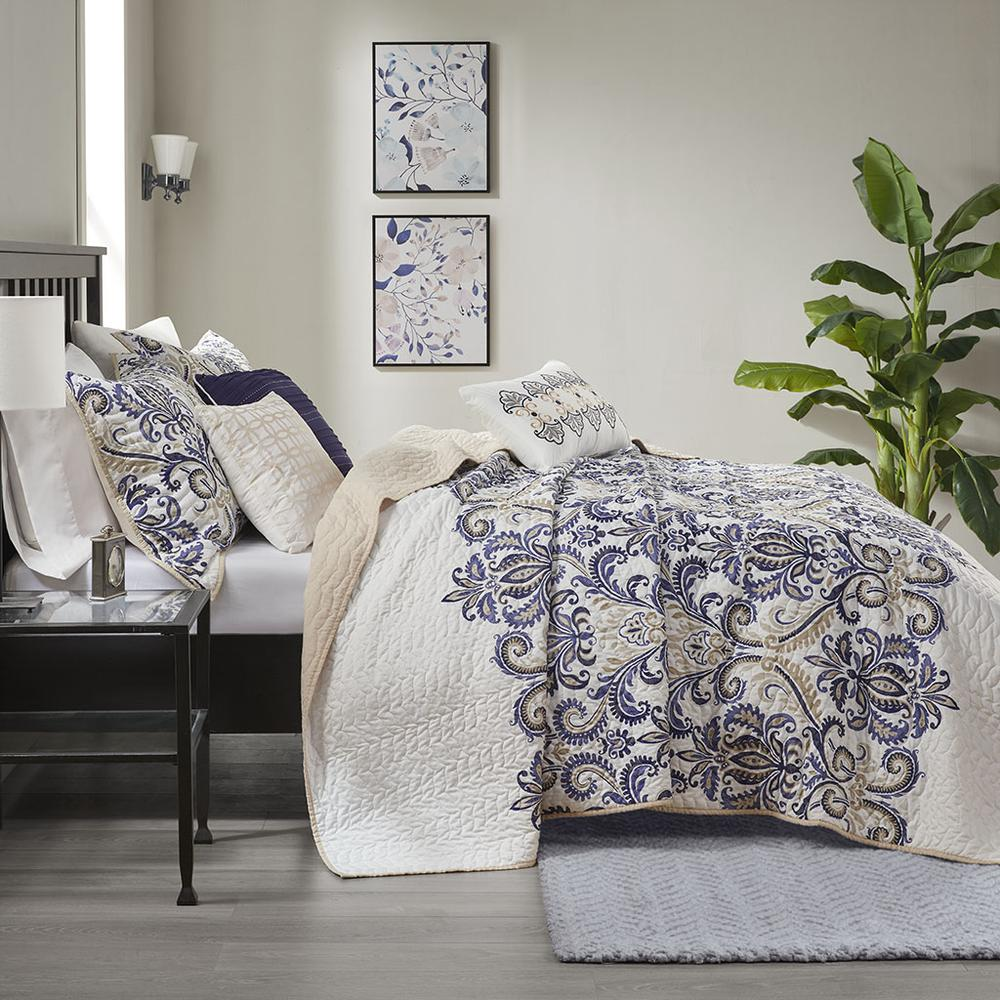 Start2Finish 6-piece reversible quilt bedding set with matching throw pillows, featuring a stylish, colorful pattern on both sides.
