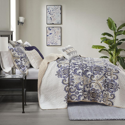 Start2Finish 6-piece reversible quilt bedding set with matching throw pillows, featuring a stylish, colorful pattern on both sides.