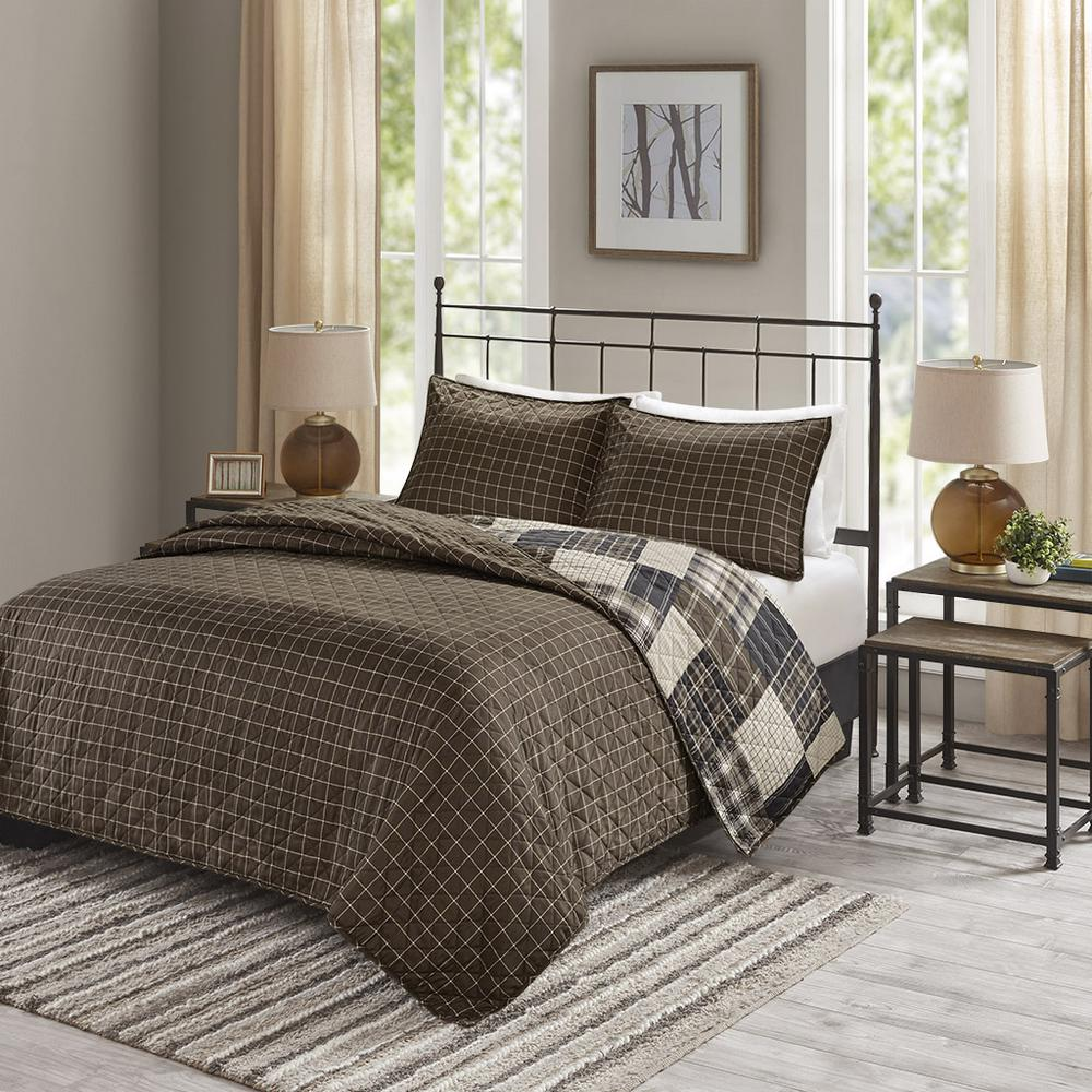 Timber 3-piece reversible printed quilt set from Start2Finish in black and brown bedding with woodgrain pattern.