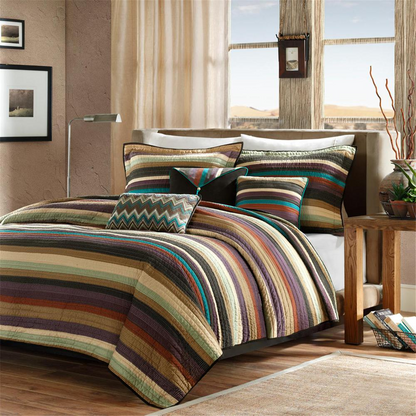 Start2Finish Yosemite reversible quilt set with multi-color bedding and matching throw pillows, featuring a vibrant, patterned design.
