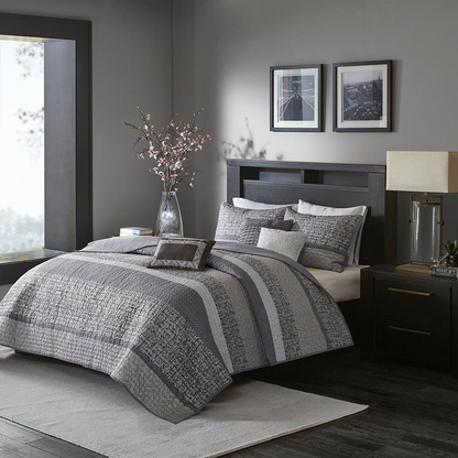 Start2Finish 6-piece reversible jacquard quilt bedding set with decorative throw pillows, showcasing intricate patterns and textures.
