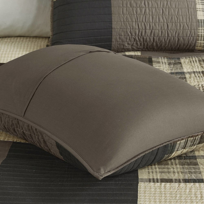 Start2Finish Winter Hills oversized cotton quilt set in tan, showing the textured fabric and neatly folded bedding on a bed.