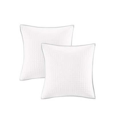 Cotton Jacquard duvet cover set with euro shams and throw pillows featuring intricate woven patterns, in neutral tones.