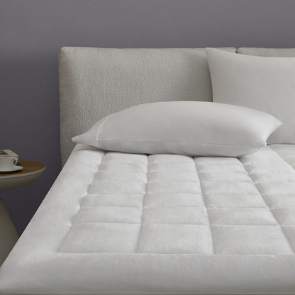 Overfilled hypoallergenic waterproof mattress pad by Start2Finish, plush down alternative filling with waterproof fabric for comfort and protection.
