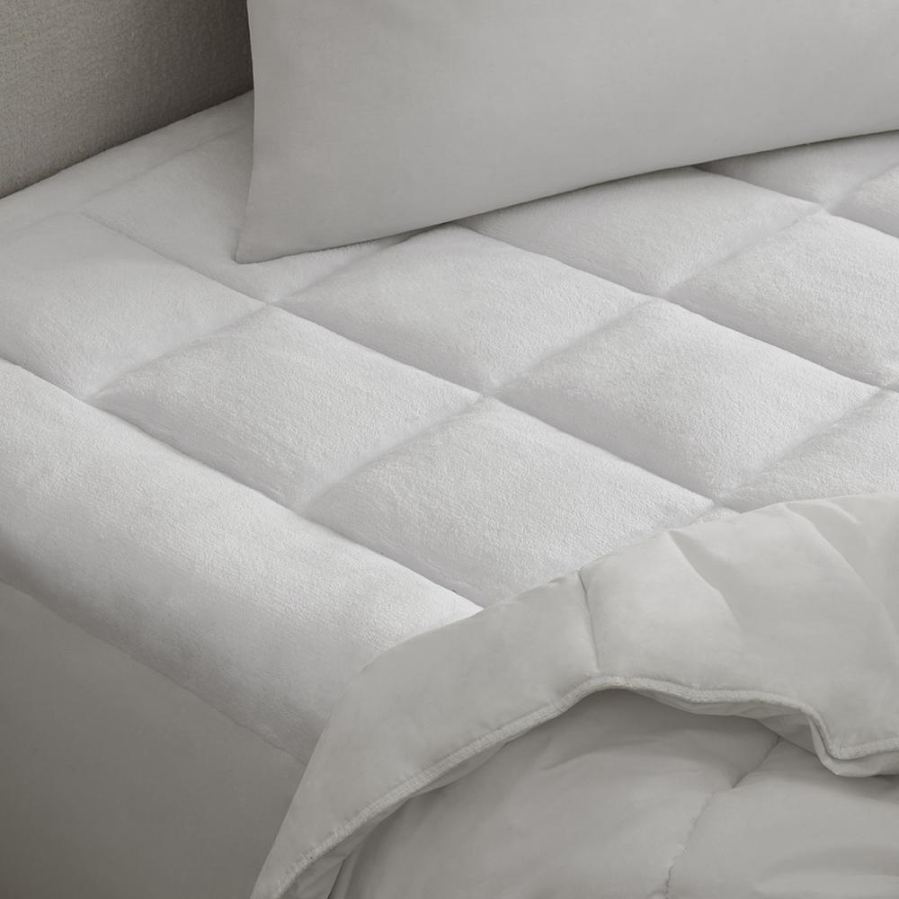 Overfilled plush hypoallergenic down alternative waterproof mattress pad by Start2Finish with soft quilted surface and waterproof backing.