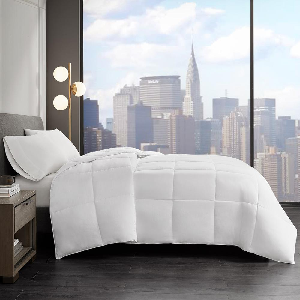 Start2Finish cotton down alternative featherless comforter shown draped on a bed, highlighting its plush, soft, and lightweight design.