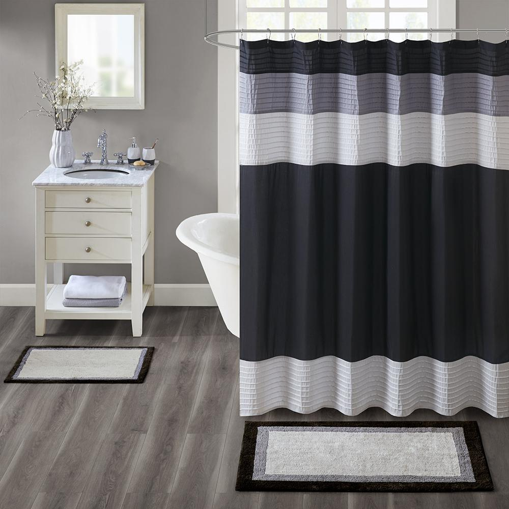 Cotton tufted bath rug by Start2Finish with a soft, plush texture and a neutral color, designed for bathroom comfort and style.