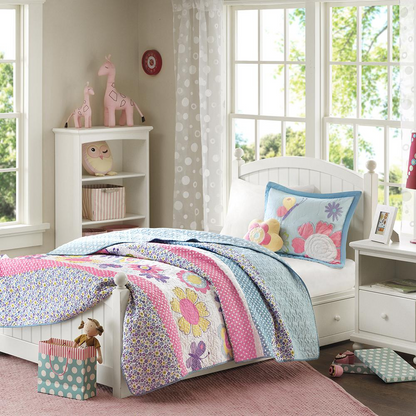 Reversible quilt set with matching throw pillow from Start2Finish, showcasing colorful patterns and cozy bedding design.