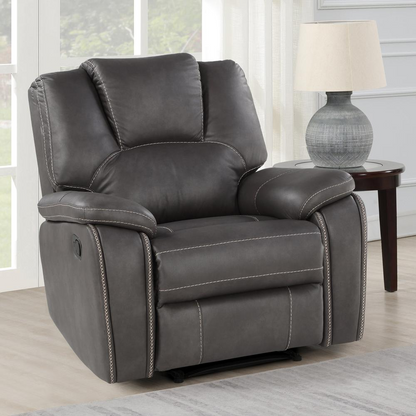 Katrine manual recliner chair in charcoal fabric, featuring cushioned armrests and a sturdy wooden base for comfortable seating.