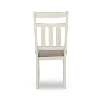 Distressed white Turino side chair from Start2Finish, showcasing a rustic wooden furniture piece with a weathered finish.