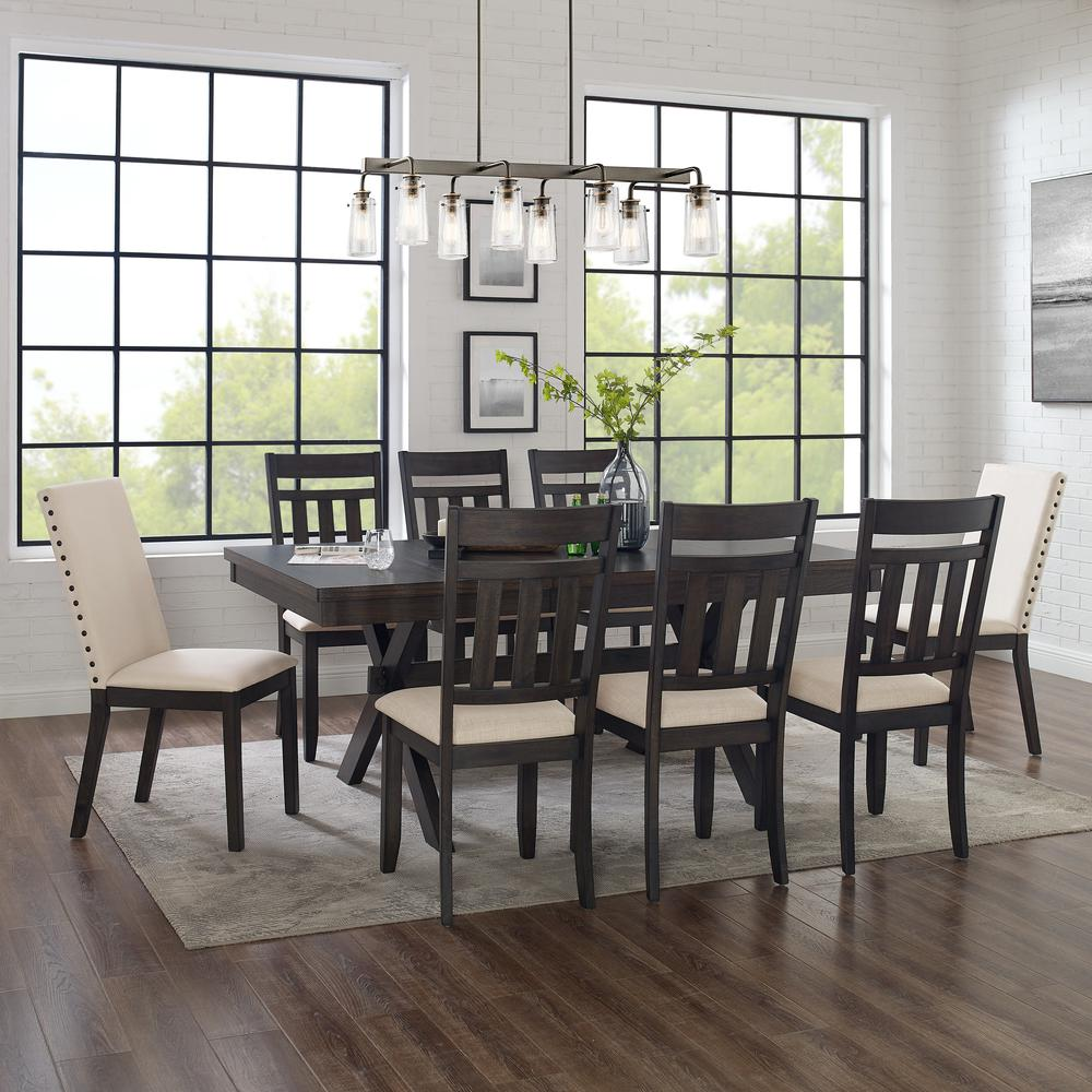 Hayden 9-piece dining table set by Start2Finish with a wooden table, six slat back chairs, and two additional chairs.