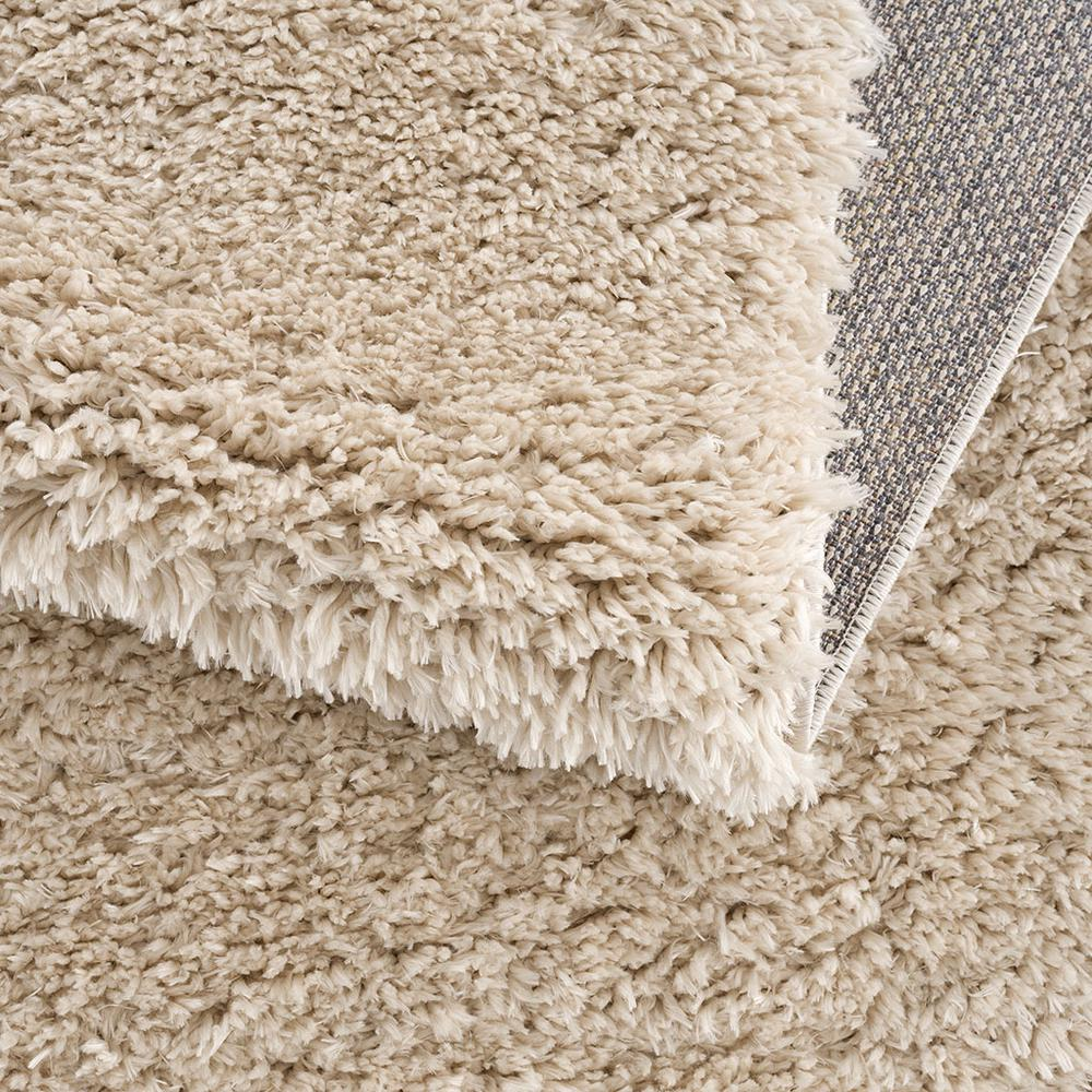 Super soft polyester shag area rug by Start2Finish with plush, textured fibers in a cozy, modern design.