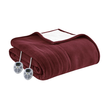 Start2Finish heated blanket spread out on a bed, showing its soft fabric and integrated heating controls for cozy warmth.