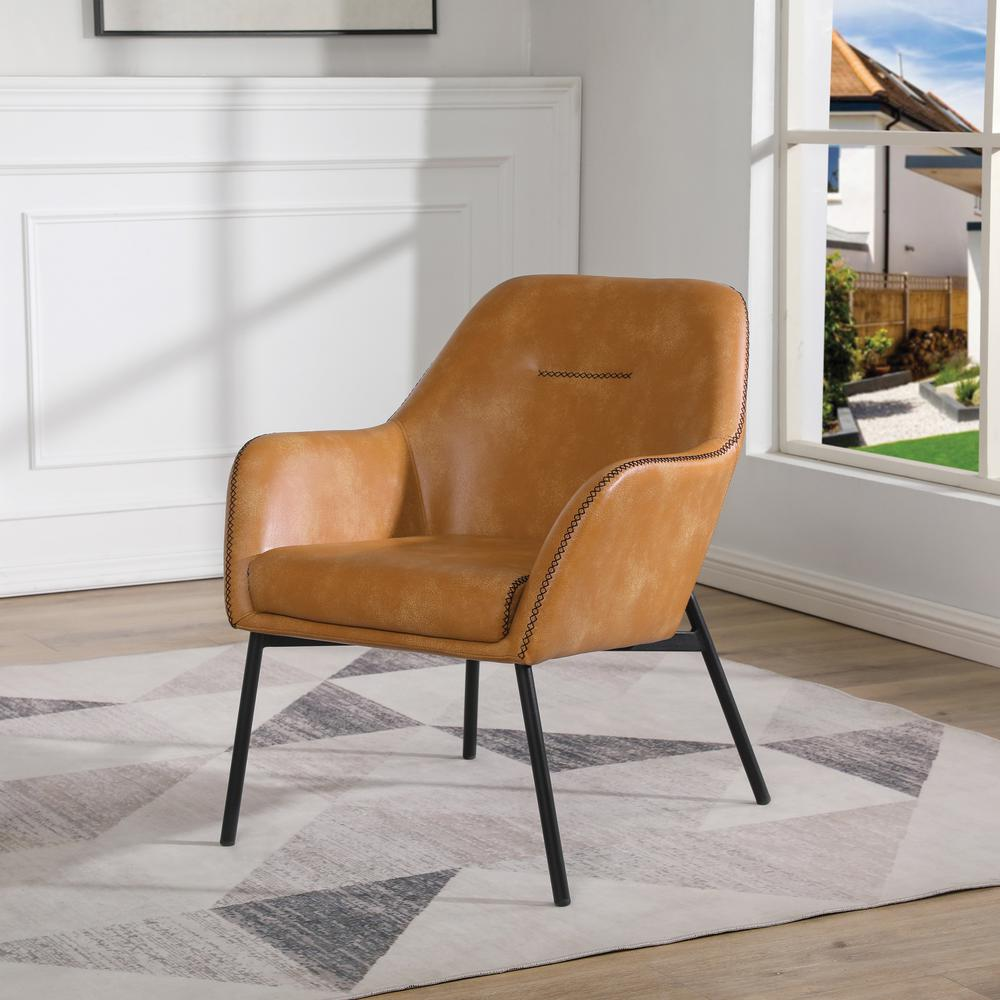 Brooks Accent Chair in sand faux leather with black stitching and black legs, modern and stylish seating for living rooms.