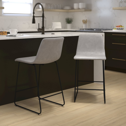 Set of 2 24-inch Light Gray LeatherSoft counter height barstools with wooden legs and metal footrests by Start2Finish.