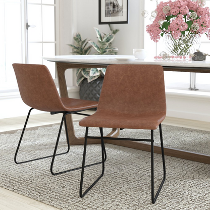 Set of 2 Start2Finish 18-inch light brown mid-back sled base dining chairs with black frames, showing upholstered seats and sleek design.