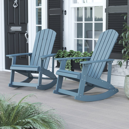 Two sea foam Adirondack rocking chairs by Start2Finish, featuring wide armrests and curved backrests, set on a grassy outdoor area.