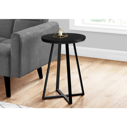 Black round accent side table from Start2Finish, ideal as a nightstand or living room end table with a lamp on top.