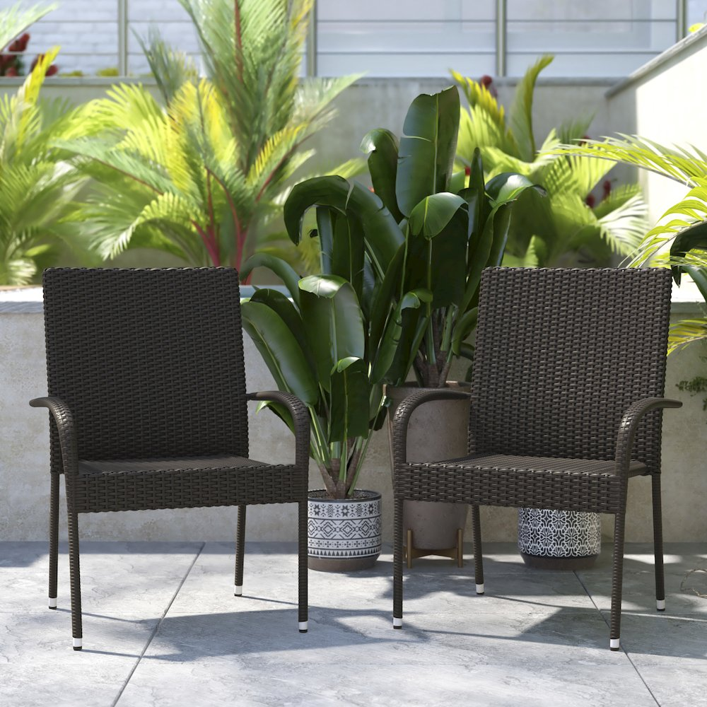 Pair of Start2Finish wicker dining chairs with arms, stackable, fade- and weather-resistant steel frames in espresso for indoor or outdoor use.