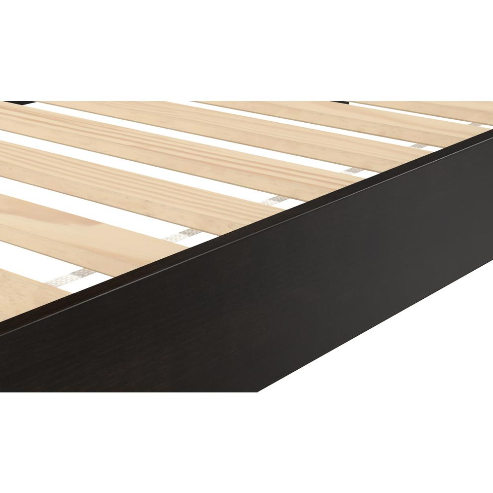 Black Nix solid wood platform bed by Start2Finish with a sleek, modern design and sturdy construction, shown in a bedroom setting.