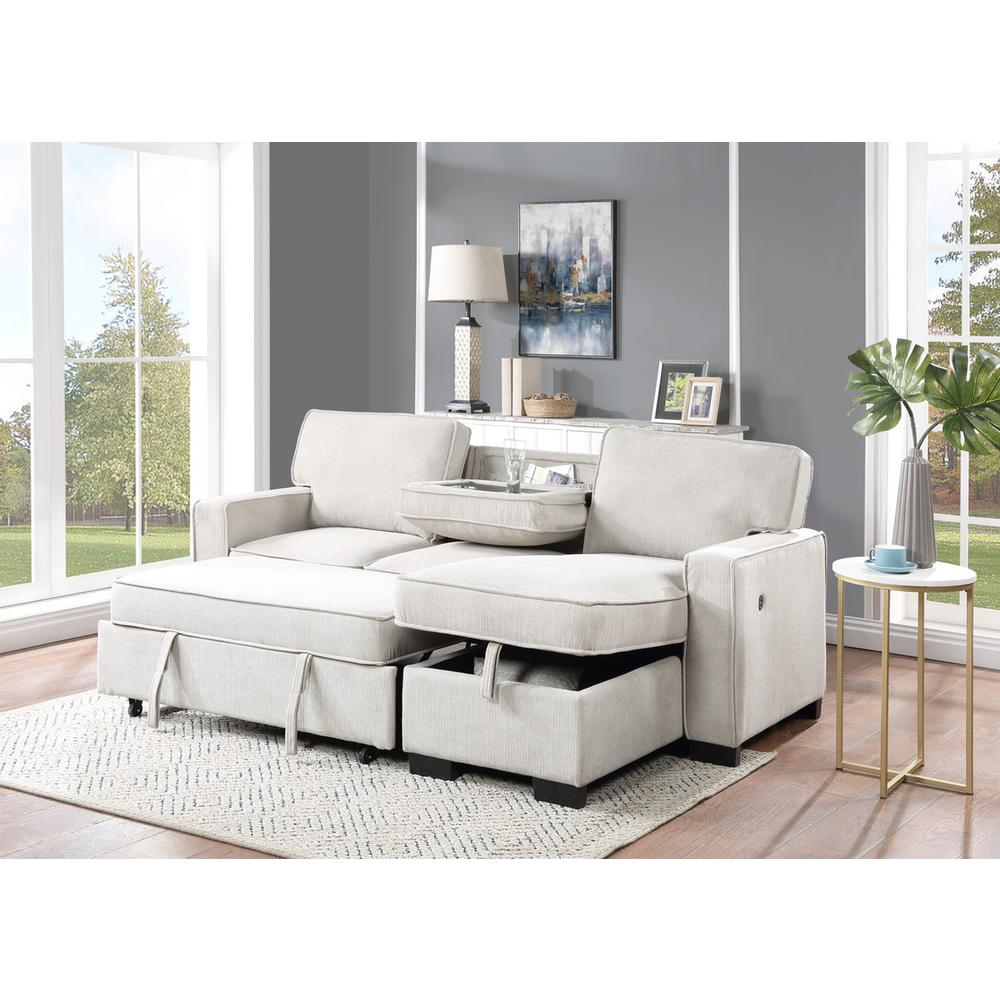 Start2Finish Estelle beige fabric reversible sleeper sectional with storage chaise, drop-down table, 2 cup holders, and 2 USB ports.