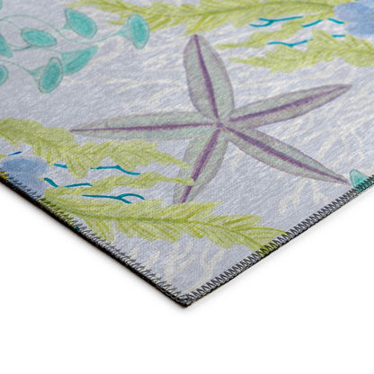 Start2Finish Surfside ASR31 aqua washable indoor/outdoor rug, 9x12 feet, with a vibrant, water-inspired pattern suitable for any space.