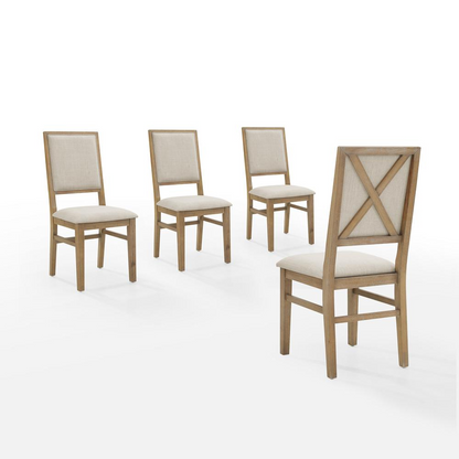 Set of four Joanna upholstered back dining chairs by Start2Finish, featuring plush fabric seats and elegant wooden legs.