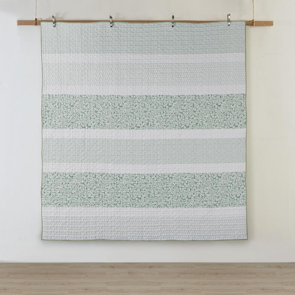Start2Finish 4-piece seersucker quilt set with matching throw pillow, featuring a textured blue and white striped fabric.